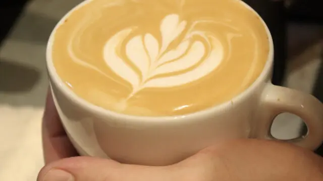 pouring hot latte