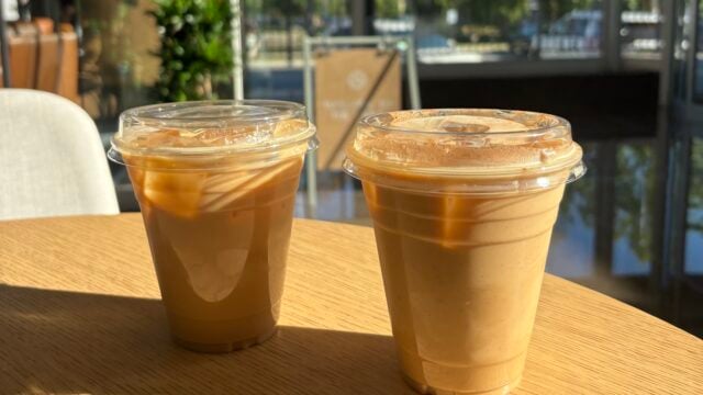 iced lattes sitting on table with bright lighting
